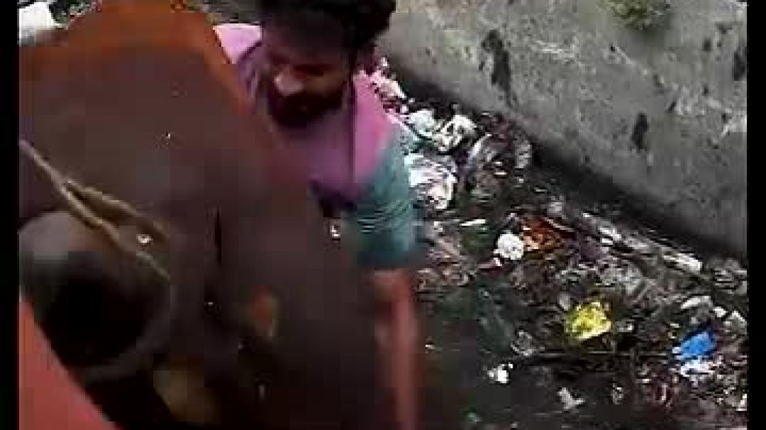 ⁣Hero Climbs Into Garbage Drain to Save Animal! 🦸♂️🐾 @kindnessmatters  @res